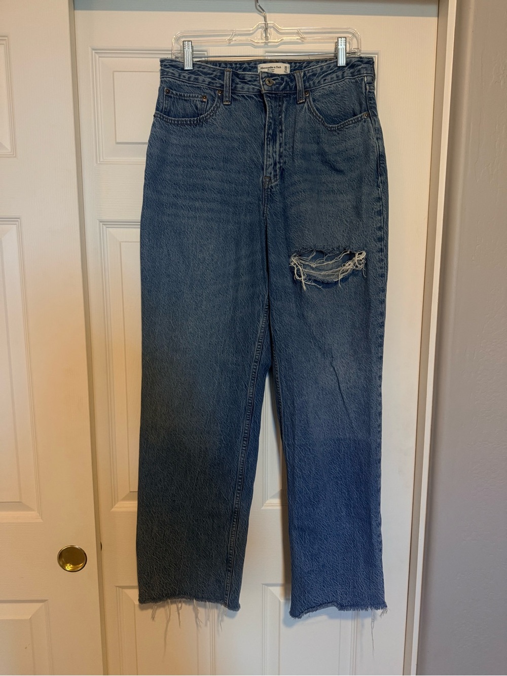 Abercrombie “The Loose High Rise Curve Love” with distressed thigh & frayed hem